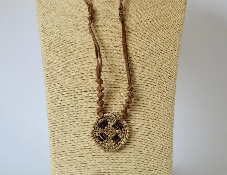 African necklace from natural leather and palm straw